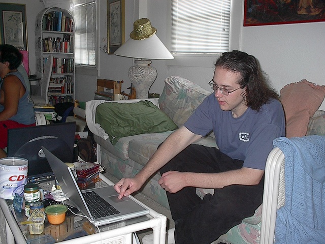 Nick burns the favor CDs on his beloved computer Winter.