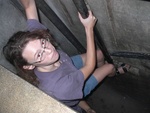 Julia climbing pipes.