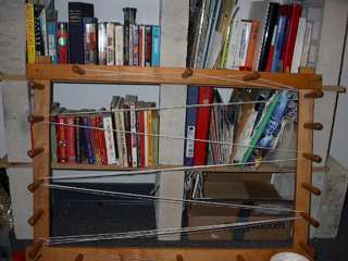 [Warping board against bookcase]